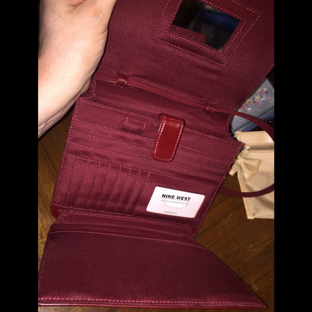 Nine West’s Red Organizer Crossbody Clutch
